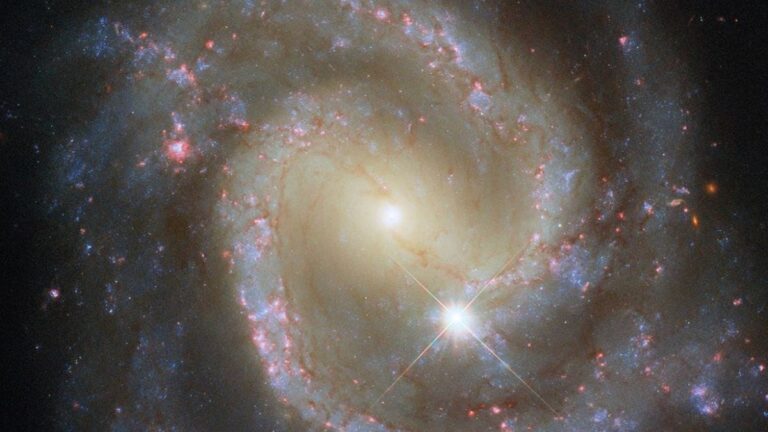 Hubble Spots Isolated Barred Spiral Galaxy That’s Secretly Part of a Cosmic Duo