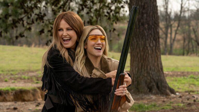 Margo and Sophie hug and smile in The Hunting Wives