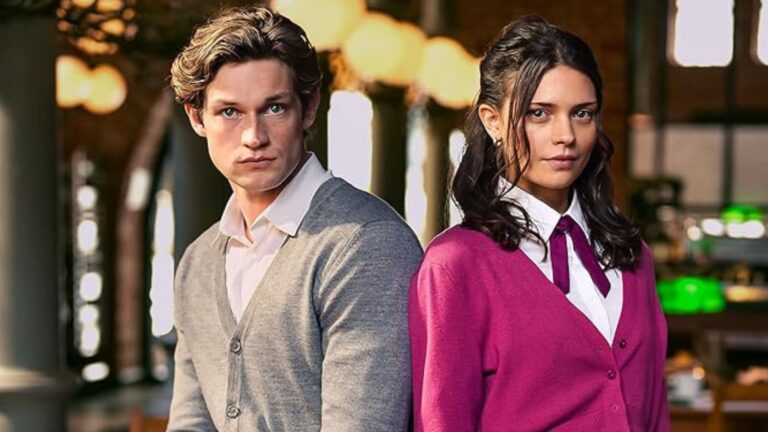 Ruby and James stand facing away from each other