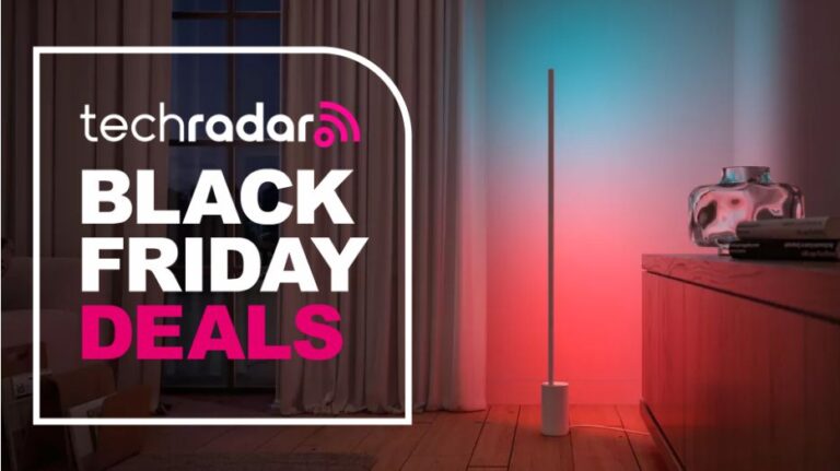 The Philips Hue Gradient Floor Lamp is lighting up a corner in a living room. To the left, a badge reads "Tech Radar Black Friday deals".