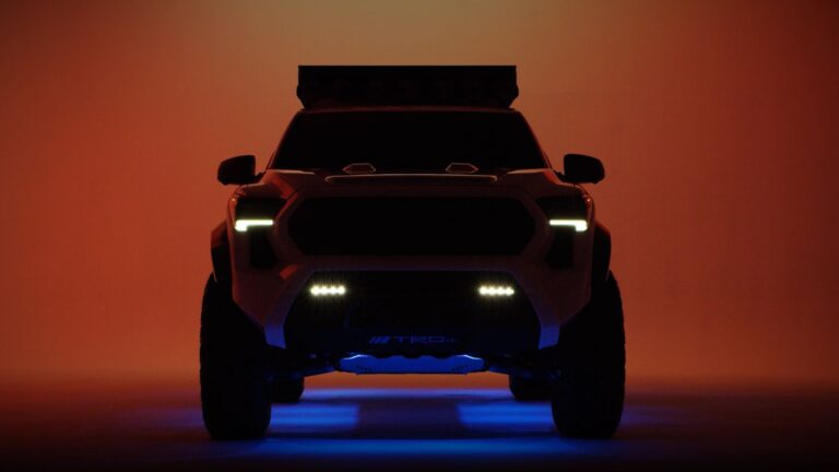 A Tacoma H2-Overlander truck in a studio