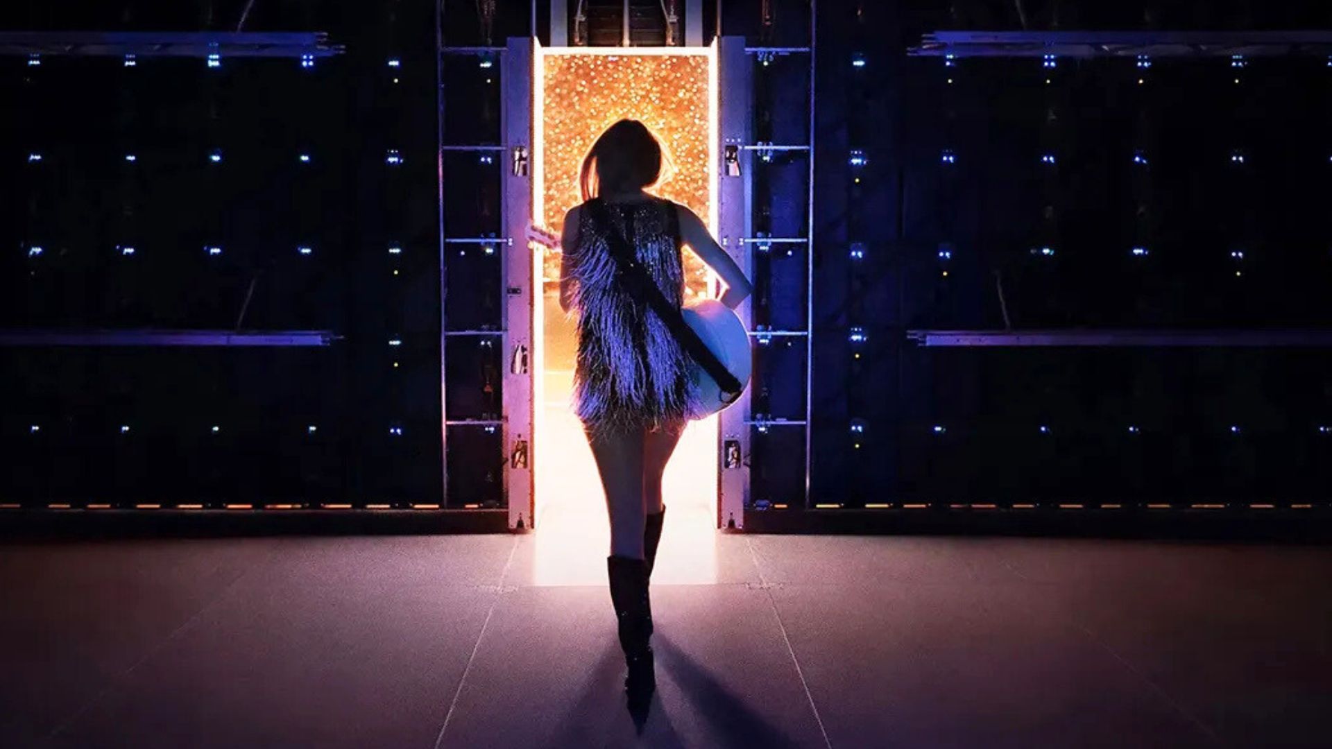 Taylor Swift walks through stage doors