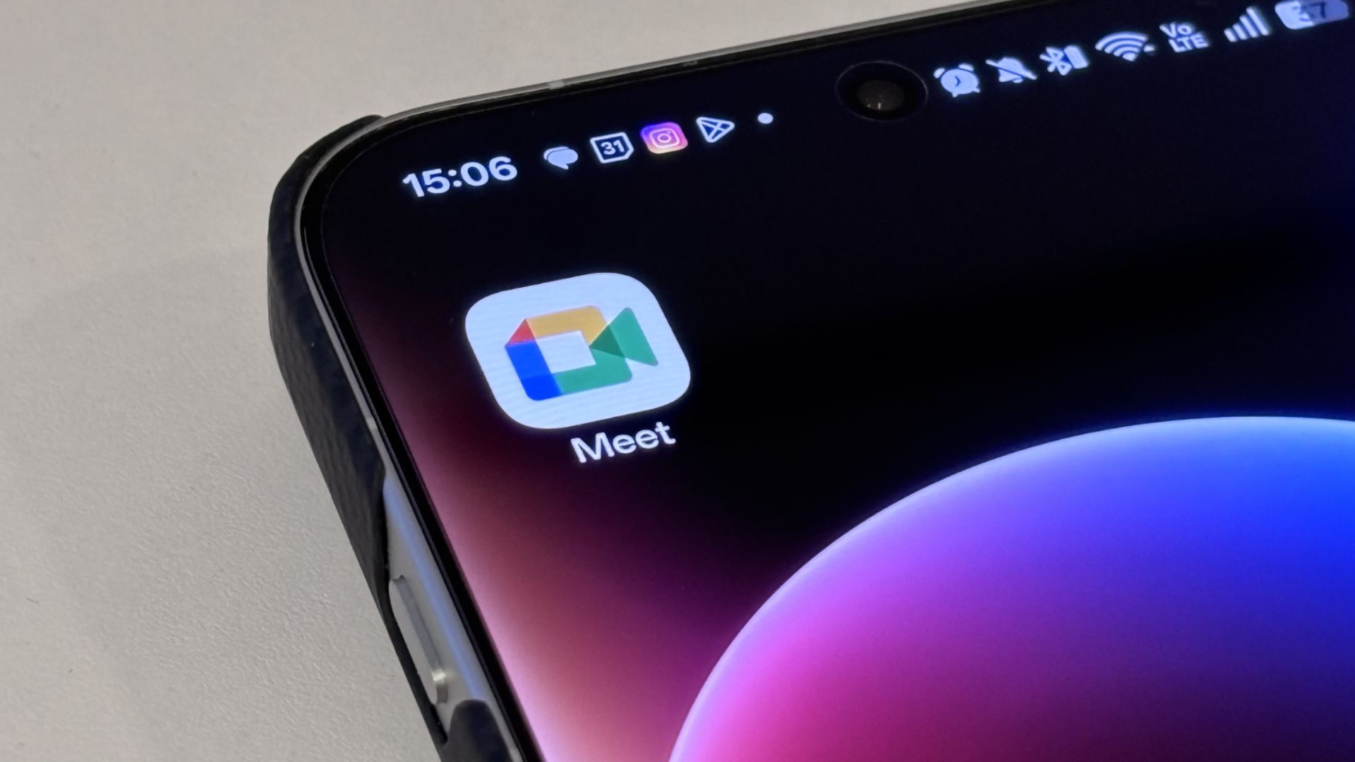 The Google Meet app icon on an Android phone