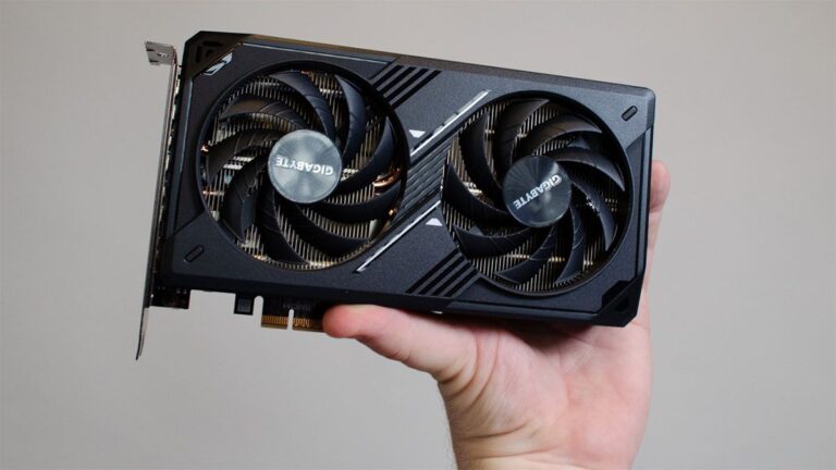 An Nvidia RTX 5060 held in a hand