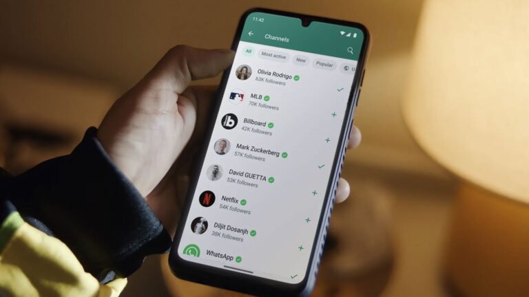 A phone displaying the channels screen on WhatsApp