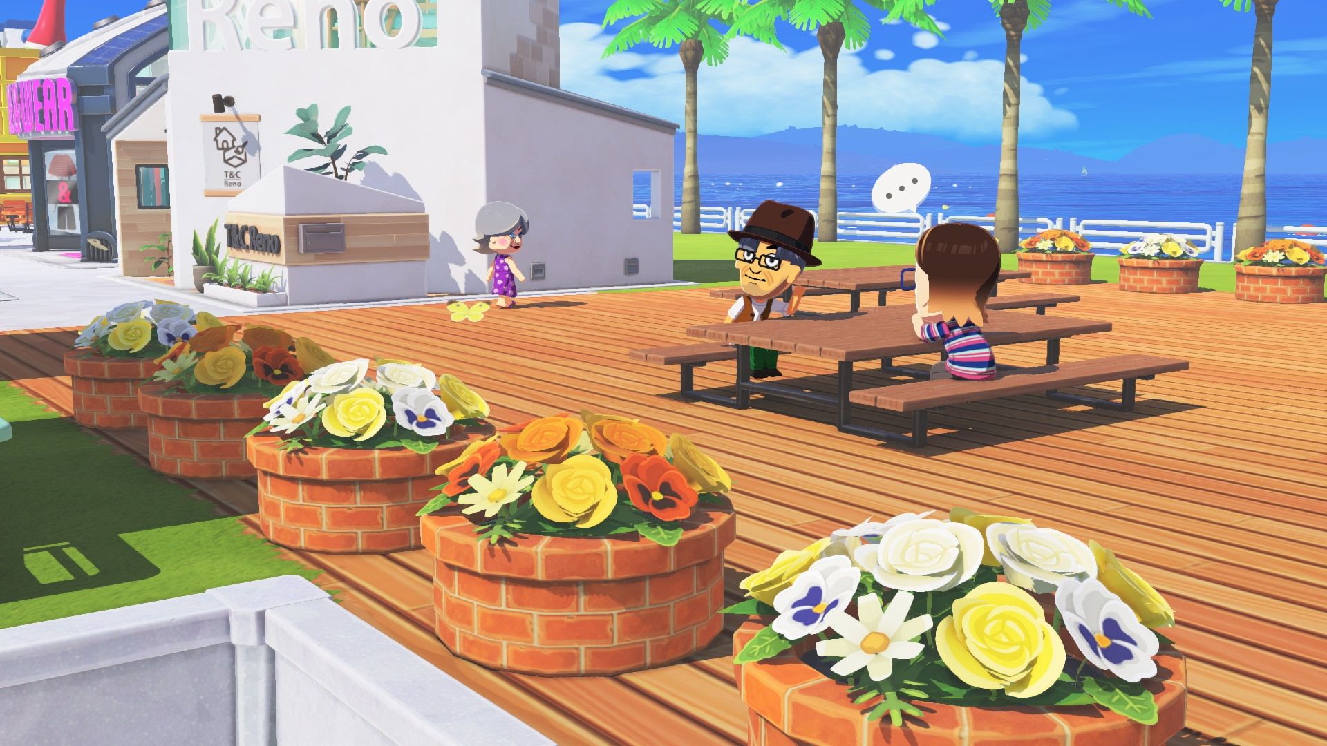 Miis engage in chatter on a sunny boardwalk in Tomodachi Life: Living the Dream