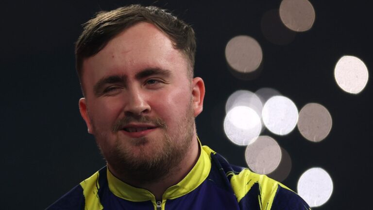 Luke Littler winks in celebration at the 2025/26 World Darts Championship