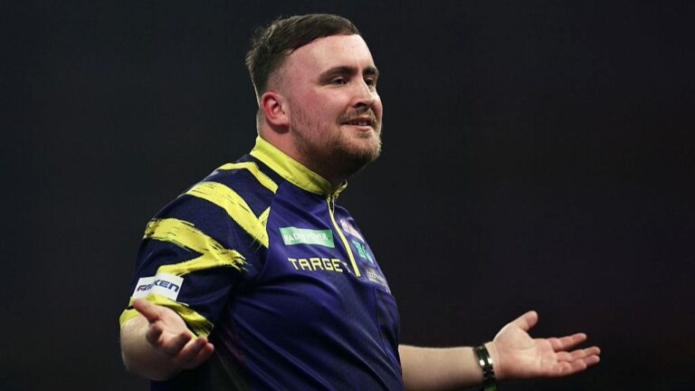 Luke Littler celebrates winning a match at the 2026 PDC Darts World Championship