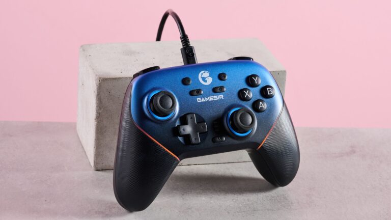 GameSir Super Nova on table with pink background, with USB-C cable attached