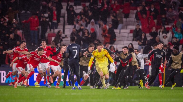 Benfica goalkeeper Anatoliy Trubin celebrates scoring against Real Madrid