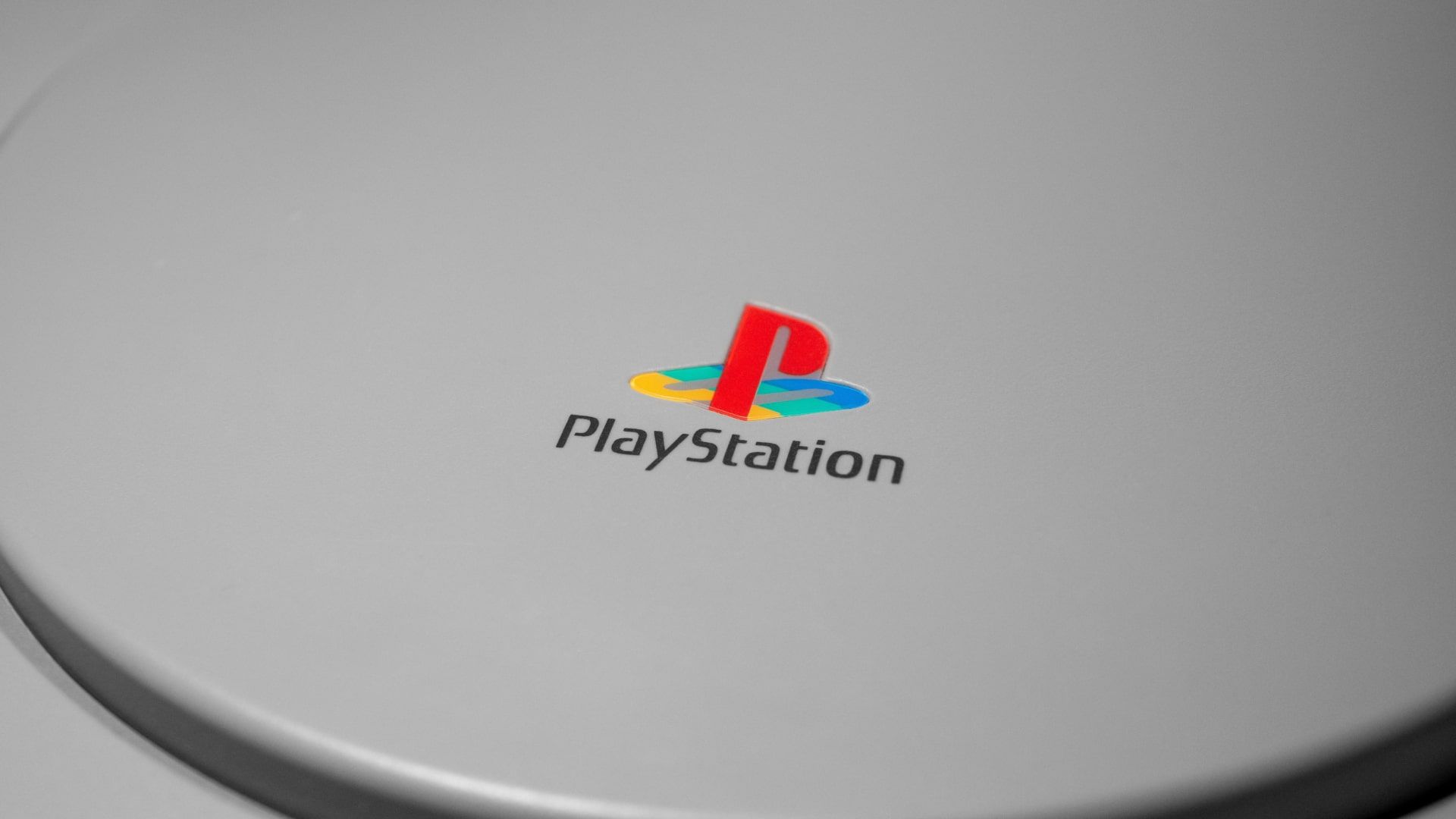 A close-up of a Sony PlayStation console.