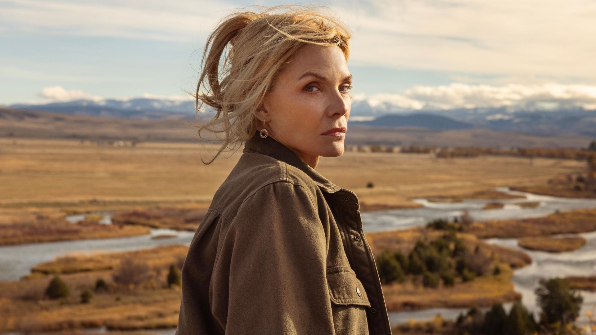 Michelle Pfeiffer looks into the distance