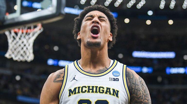Yaxel Lendeborg #23 of the Michigan Wolverines after being fouled and making a basket during the second half of a NCAA Men's Basketball Tournament Elite Eight game against the Tennessee Volunteers at the United Center on March 29, 2026 in Chicago, Illinois.