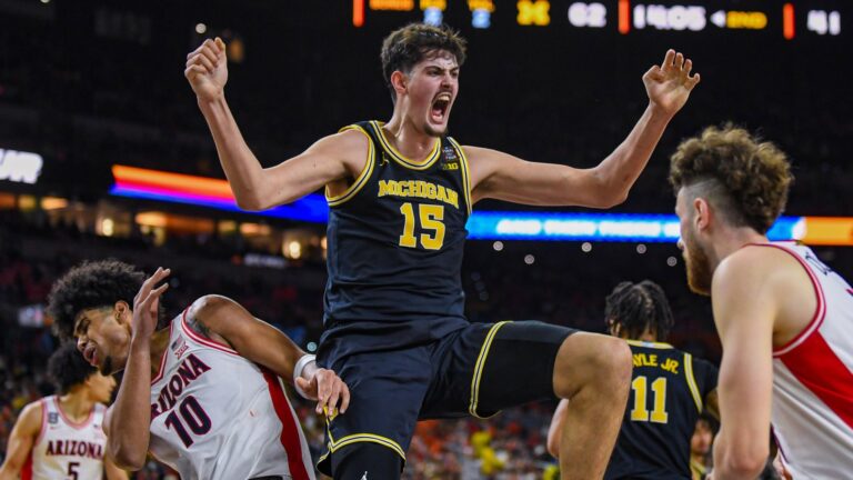 Aday Mara of the Michigan Wolverines dunking the ball at March Madness 2026
