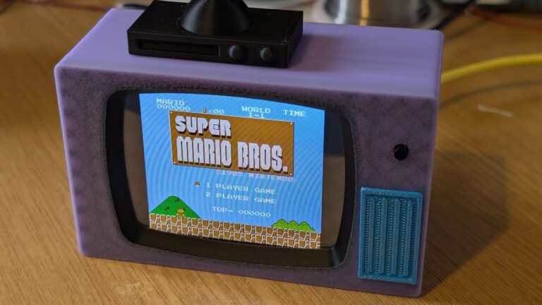 This DIY retro-style mini-TV looks like it's from the Simpsons, and plays classic NES games and movies — and yes please, I want one