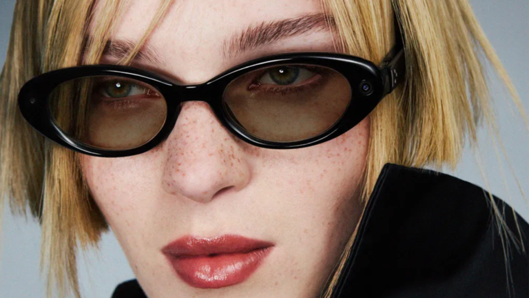 Samsung's Android XR smart glasses worn by a model with blonde hair 
