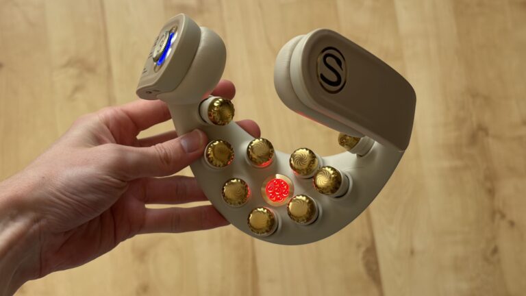 This foldable, futuristic neck massager will heat your aching muscles and talk to you while it does so — yes, really