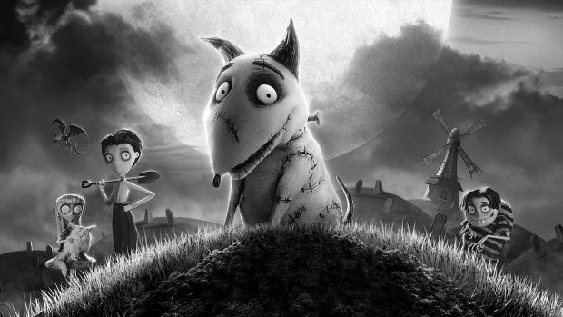 Victor and his dog Sparky in a dark graveyard