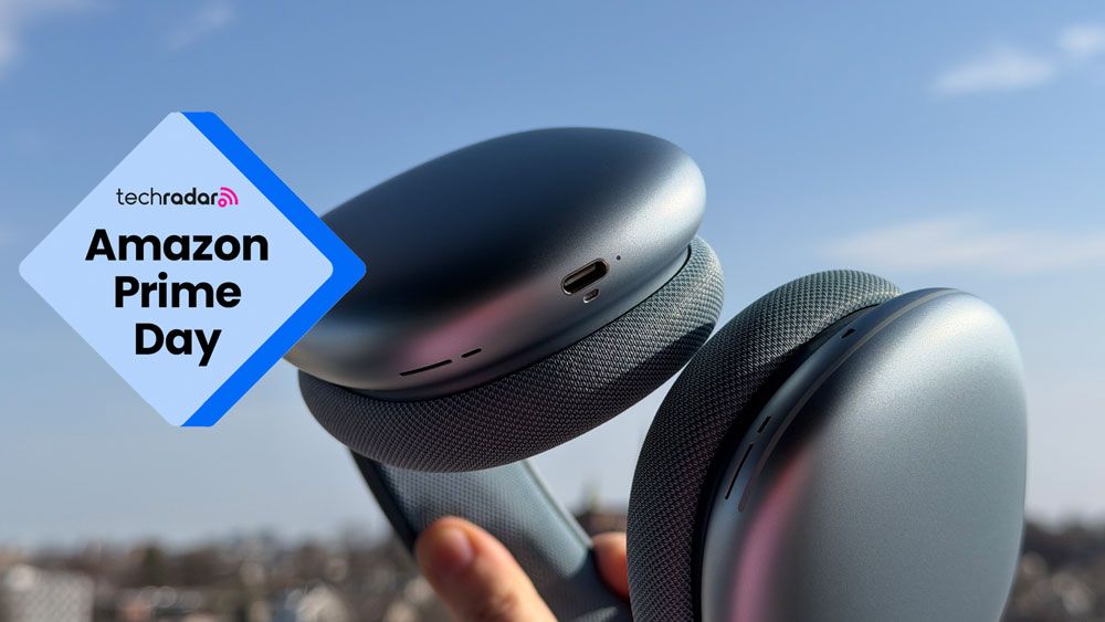 Blue Apple AirPods Max 2 being held in the air, with an Amazon Prime Day badge on the left.