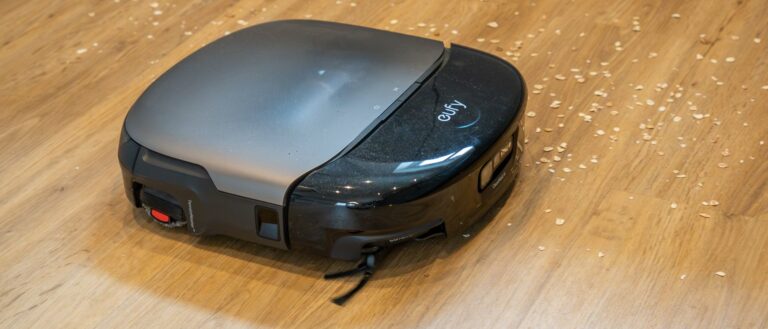 Eufy Omni S2 robot vacuum cleaning oats off hard floor