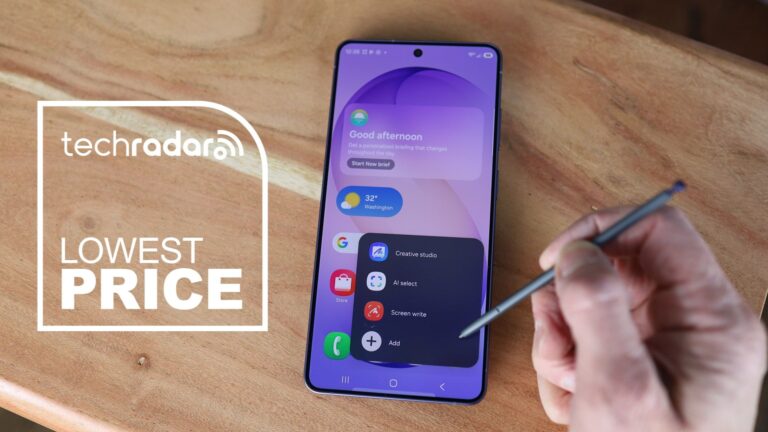 Samsung Galaxy S26 Ultra on desk top with person holding S-Pen, alongside a lowest price text overlay