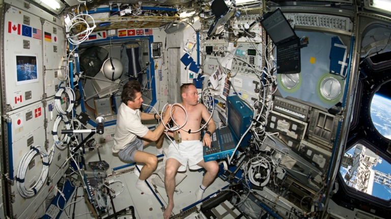 In this image, ultrasound procedures help provide for medical diagnoses on the International Space Station.