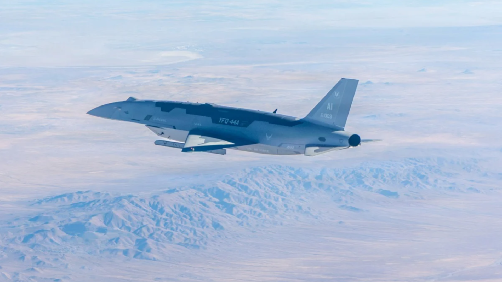 Unmanned fighter jet carrying an AIM-120 AMRAAM missile (1)