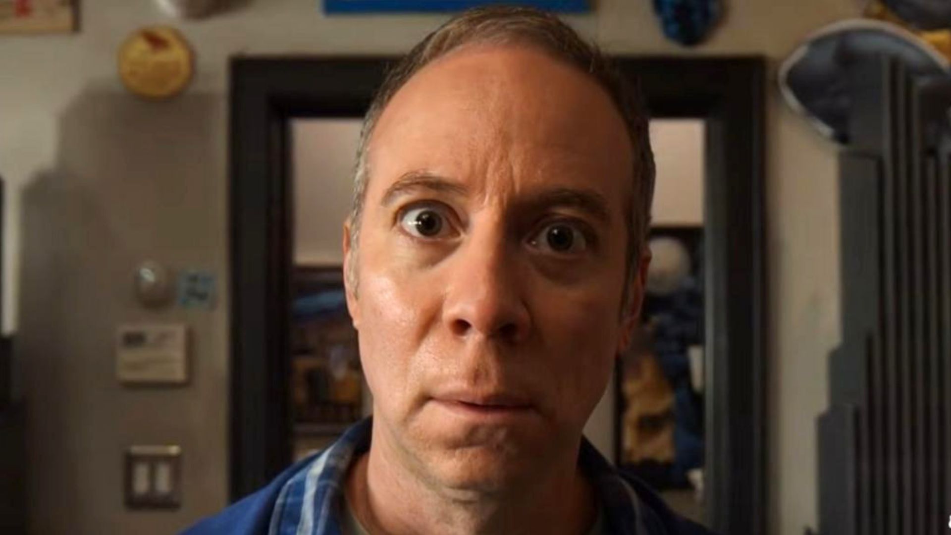 Stuart stares into the camera