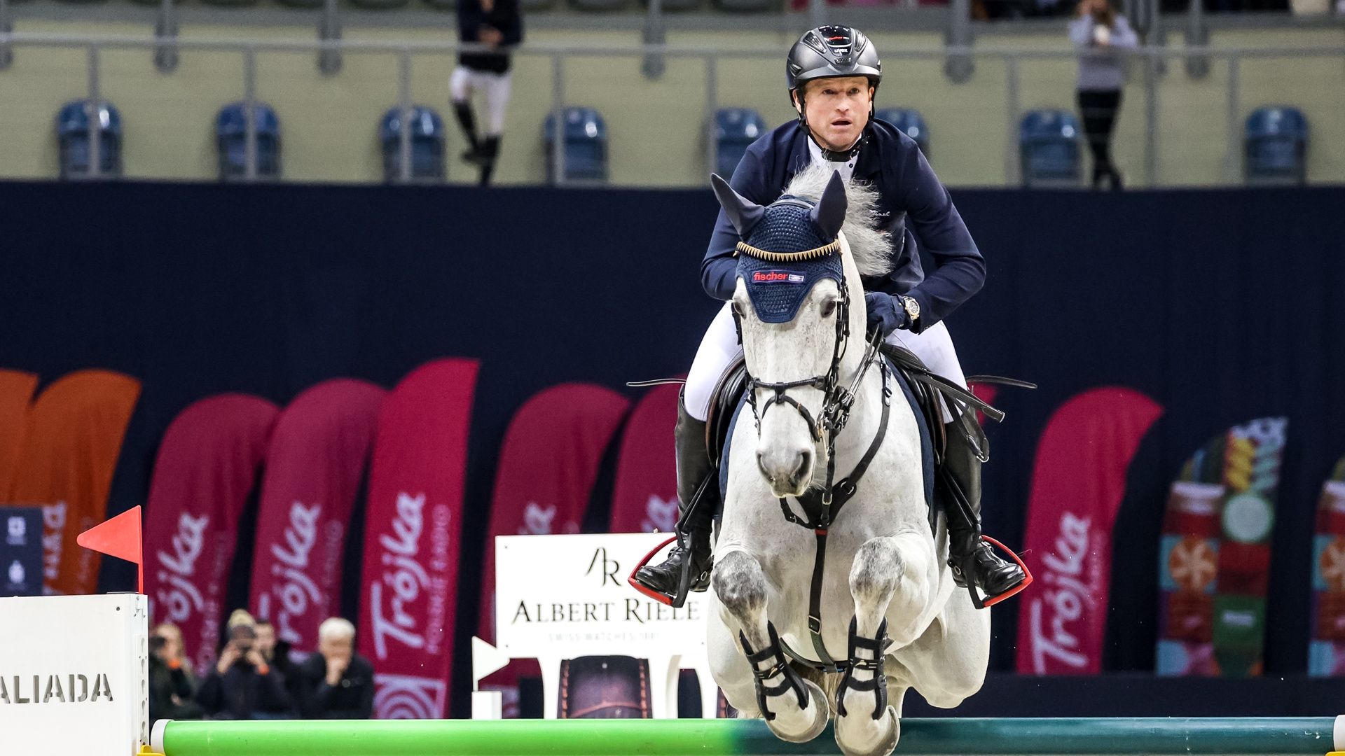 Michael Jung of Germany on Fischer Doupower competes in show jumping.