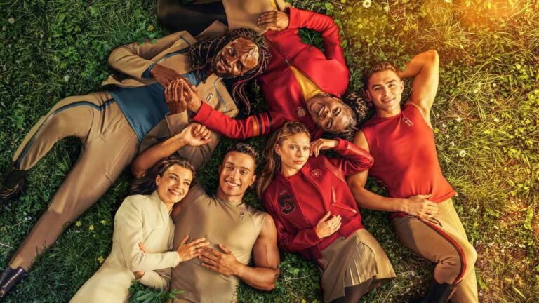 The cast of Starfleet Academy lie on the grass