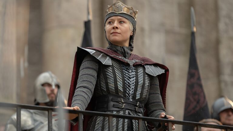 Rhaenyra standing as she holds onto a guardrail in House of the Dragon season 3 episode 8