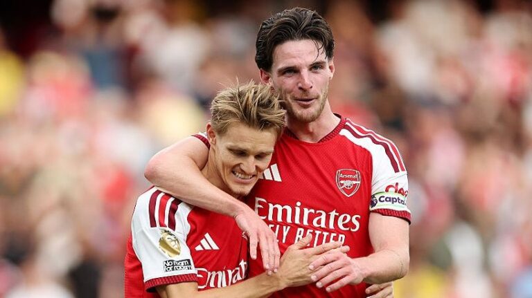 Martin Odegaard and Declan Rice of Arsenal celebrate after the Premier League 2026/27 match between Arsenal FC and Chelsea FC at Emirates Stadium. 