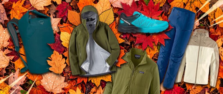 Selection of outdoor apparel from Backcountry, against a background of autumn leaves