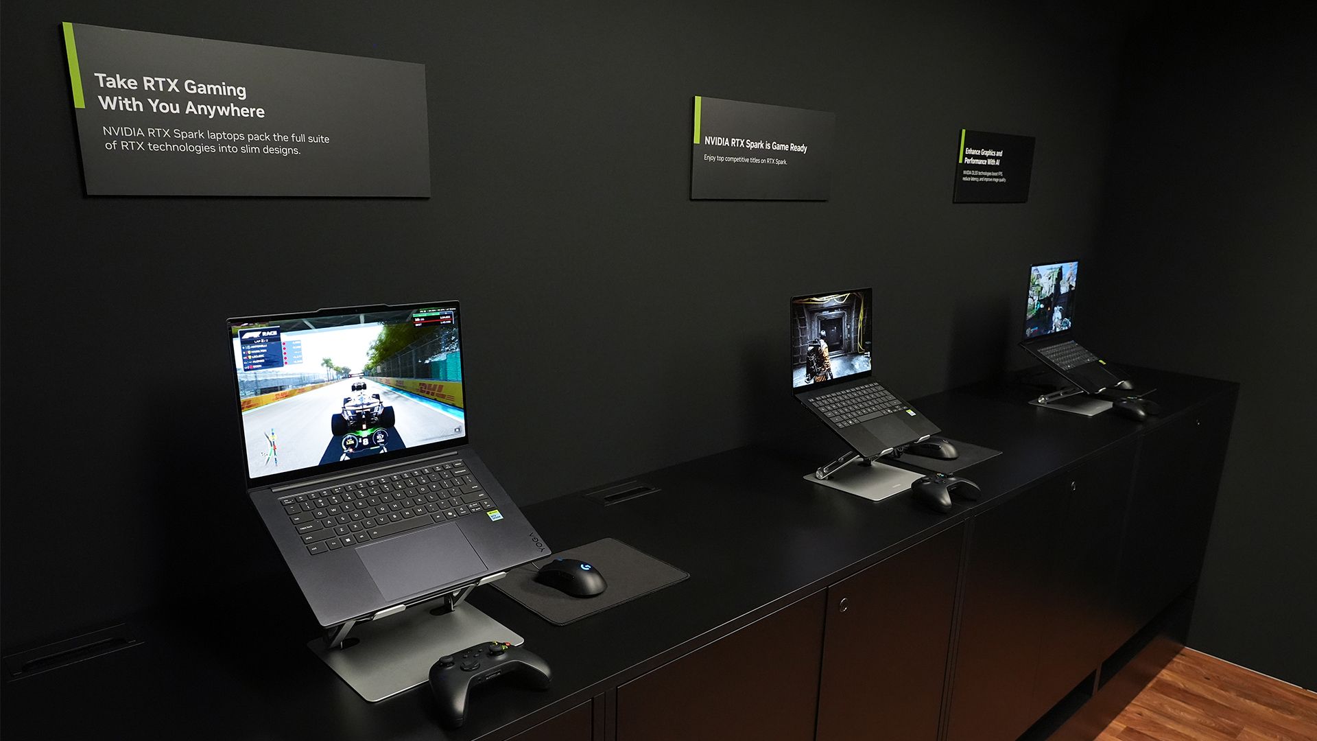RTX Spark-enabled laptops on a black stage