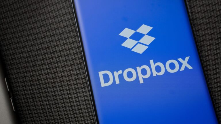 Dropbox logo is seen on a smartphone.