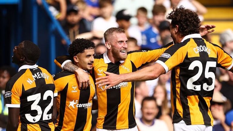 Mohamed Belloumi of Hull City celebrates their second goal with Nobel Mendy, Ollie McBurnie and Matt Crooks. 