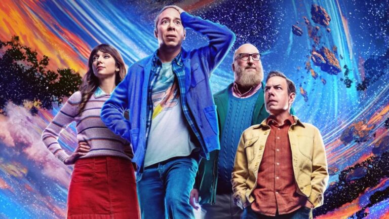 The cast pose in front of a space backdrop