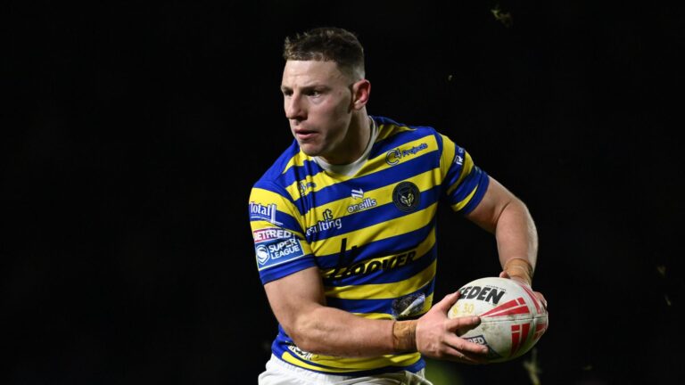 George Williams of Warrington Wolves passing the ball during a 2026 Super League match.