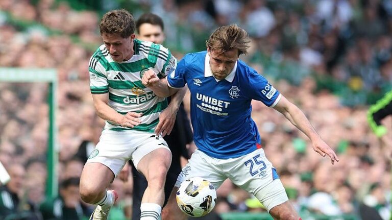 Luke McCowan of Celtic vies with Tuur Rommens of Rangers during the Premier League match between Celtic and Rangers at Celtic Park on May 10, 2026 in Glasgow, Scotland. 
