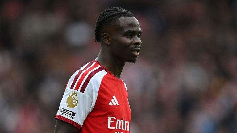 Bukayo Saka, wearing the red of Arsenal, looks on during a Premier League 2026/27 match.