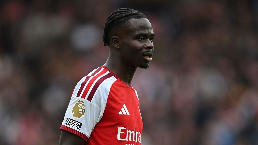 Bukayo Saka, wearing the red of Arsenal, looks on during a Premier League 2026/27 match.