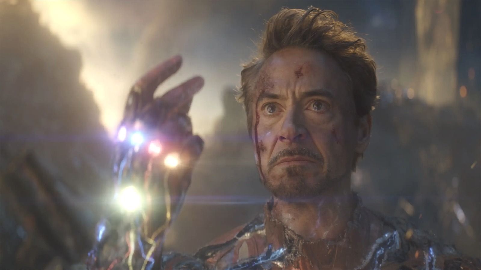 Robert Downey Jr's Tony Stark/Iron Man snapping his fingers with the Infinity Stones in Avengers: Endgame