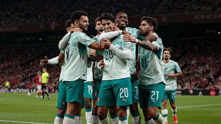 Players of Portugal and Joao Cancelo celebrate after scoring goal during the UEFA Nations League 2026/27 Group A4 MD3 League Phase match between Denmark and Portugal at Parken Stadium.