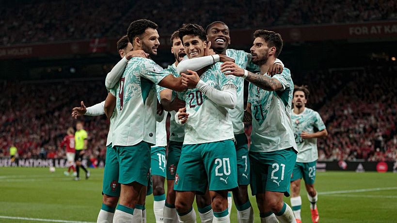 Players of Portugal and Joao Cancelo celebrate after scoring goal during the UEFA Nations League 2026/27 Group A4 MD3 League Phase match between Denmark and Portugal at Parken Stadium.