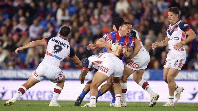 Tyson Frizell getting tackled in a Roosters vs Knights game