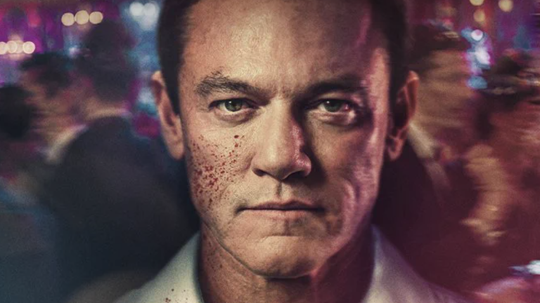 Close up of actor Luke Evans with blood-splattered face in The Party drama TV show streaming on ITV now https://www.itv.com/watch/the-party/10a1766