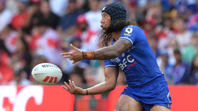 Jarome Luai of Samoa passes the ball during a rugby league match.